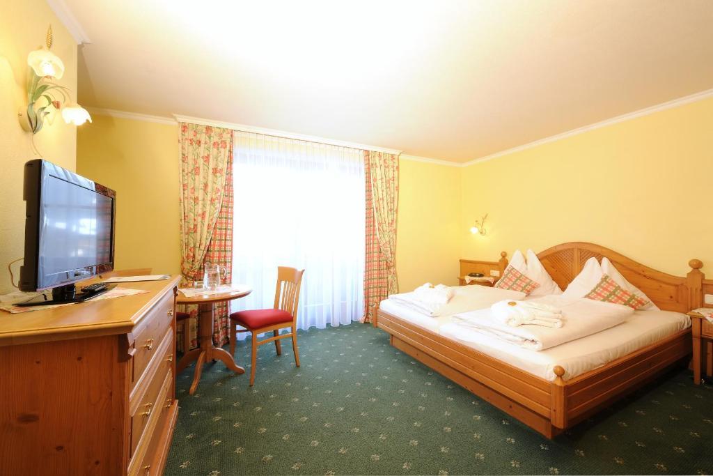 Aparthotel Kristall Altenmarkt im Pongau Pokoj fotografie